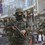 Palestinian security forces gather at the site of a protest against clashes between Palestinian security forces and militants in the northern occupied West Bank city of Jenin on December 21, 2024. (Photo: Mohammed Nasser/APA Images)