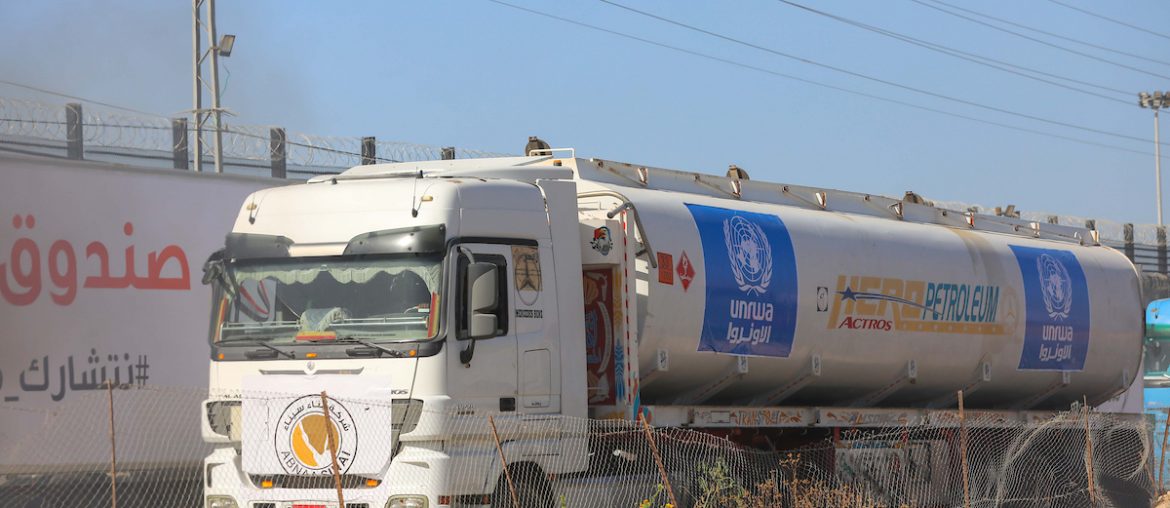 Trucks carrying humanitarian aid enter the Gaza Strip via the Rafah crossing with Egypt, hours after the start of a four-day truce in battles between Israel and Hamas, on November 24, 2023. (Photo by Naaman Omar apaimages)