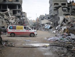 Palestinians walk among the rubble in a residential area of Beit Lahia, in the northern Gaza Strip, on November 29, 2023. (Photo: Mohammed Alaswad/APA Images)