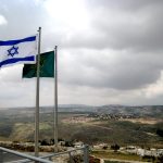 An Israeli flag overlooking an illegal Jewish settlement in the West Bank. Taken from the Israeli Herodian national park in the West Bank. (Photo: Jamie Lynn Ross/Flickr)