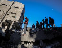 Palestinians check the site of a destroyed house after an Israeli bombardment, in the Al-Bureij refugee camp in central Gaza Strip, on January 8, 2025. (Photo: Omar Ashtawy/APA Images)