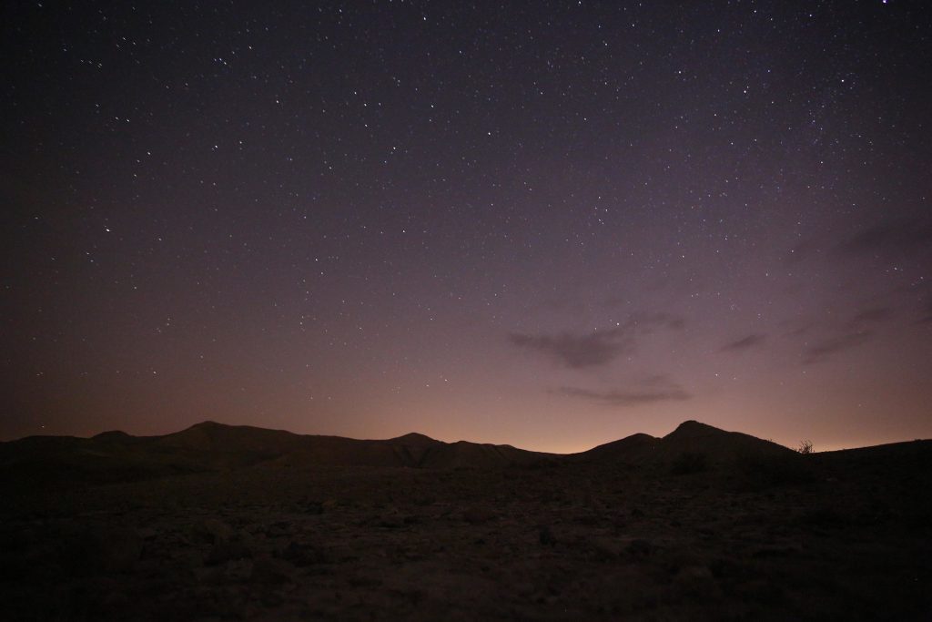 The picture taken on October 13, 2017, shows the Milky Way galaxy stretching across the night sky above the Palestinian desert east of Jerusalem. (Photo: Ayman Ameen / APA Images)