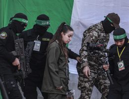 Palestinian Hamas fighters escort female Israeli soldier Agam Berger held in Gaza since the October 7, 2023, as part of a captives exchange deal with Israel, Jabalia, January 30, 2025. (Photo: Omar Ashtawy/APA Images)