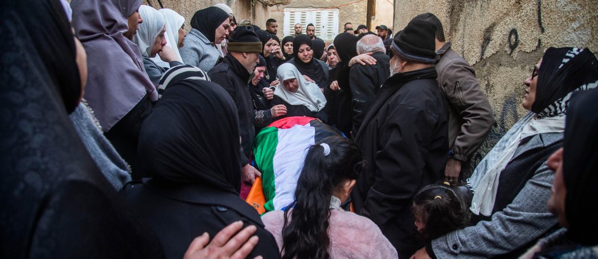 Mourners carry the bodies of six Palestinians killed during an Israeli air strike the previous day on Jenin's refugee camp in the occupied West Bank, on January 15, 2025. The Palestinian health ministry said on January 14 that an Israeli air strike on the Jenin refugee camp killed six people, including a teenager, with the Israeli military confirming it carried out an attack in the area. (Wahaj Bani Moufleh / Activestills)