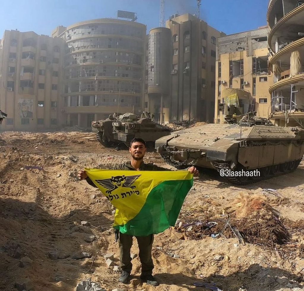 A photo posted on social media by an Israeli solider celebrating the destruction of Al-Azhar University.