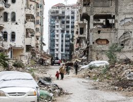 Palestinians carry boxes of aid provided by UNRWA in Gaza City, February 6, 2025. (Photo: Omar Ashtawy/APA Images)