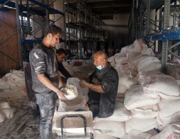 Palestinians gather at the UN agency for Palestinian refugees (UNRWA) building in Jabalia to receive 5 kg of flour following the first humanitarian aid convoy in months entering Gaza amid Israeli attacks, on March 17, 2024. (Photo: Ashraf Amra/APA Images)