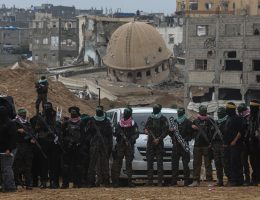 Members of the Al-Qassam Brigades, the military wing of Hamas, hand over the bodies of the Bibas family (three members) and Oded Lifshitz to Red Cross teams as part of a prisoner exchange agreement between Hamas and Israel in the Khan Yunis Governorate in the southern Gaza Strip on February 20, 2025. The Al-Qassam Brigades announced that the four Israeli hostages were alive when they were captured, but the occupation army killed them by deliberately bombing detention sites during attacks in the Gaza Strip.. Photo by Omar Ashtawy apaimages