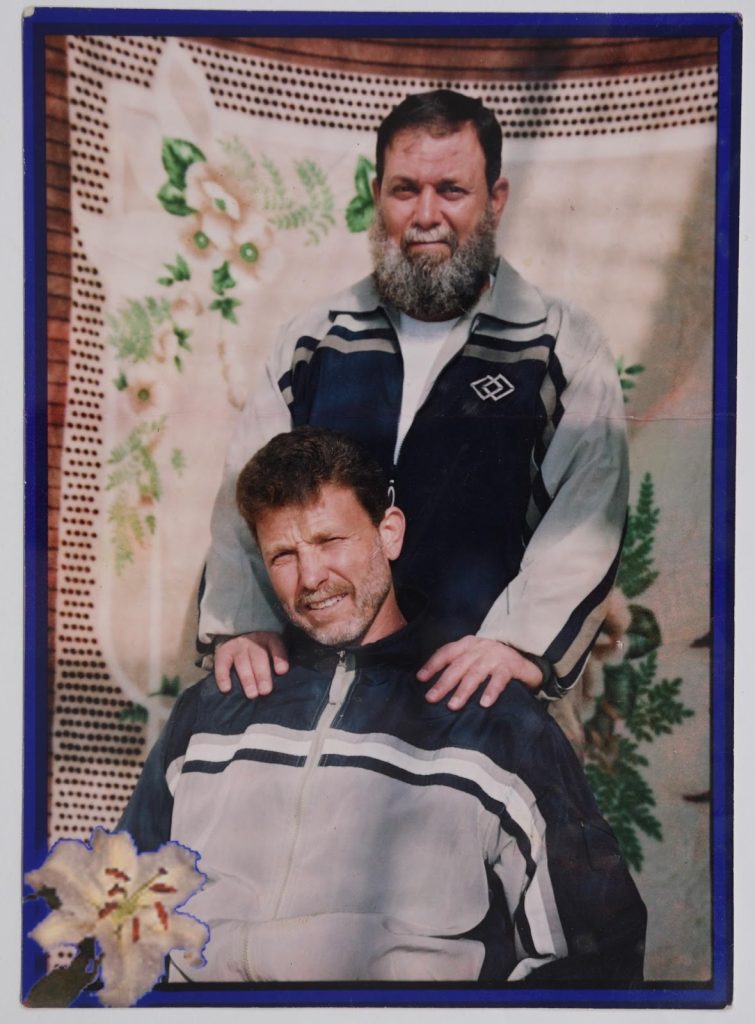 Omar "Abu Asef" barghouthi (Standing) and Nael Barghouthi (seated) in Askalan Prison, 2004. (Photo courtesy of author)