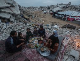 Palestinian Karam Abu Haloub and his wife Faten prepare iftar food during the third day of the holy month of Ramadan in a tent they set up on the ruins of their destroyed home in the Al-Shimaa area of Beit Lahia in the northern Gaza Strip, March 3, 2025. Thousands of Palestinian families in the Gaza Strip live in tents amidst a lack of basic necessities after the Israeli war on the Gaza Strip. (Photo by Omar Ashtawy/ apaimages)