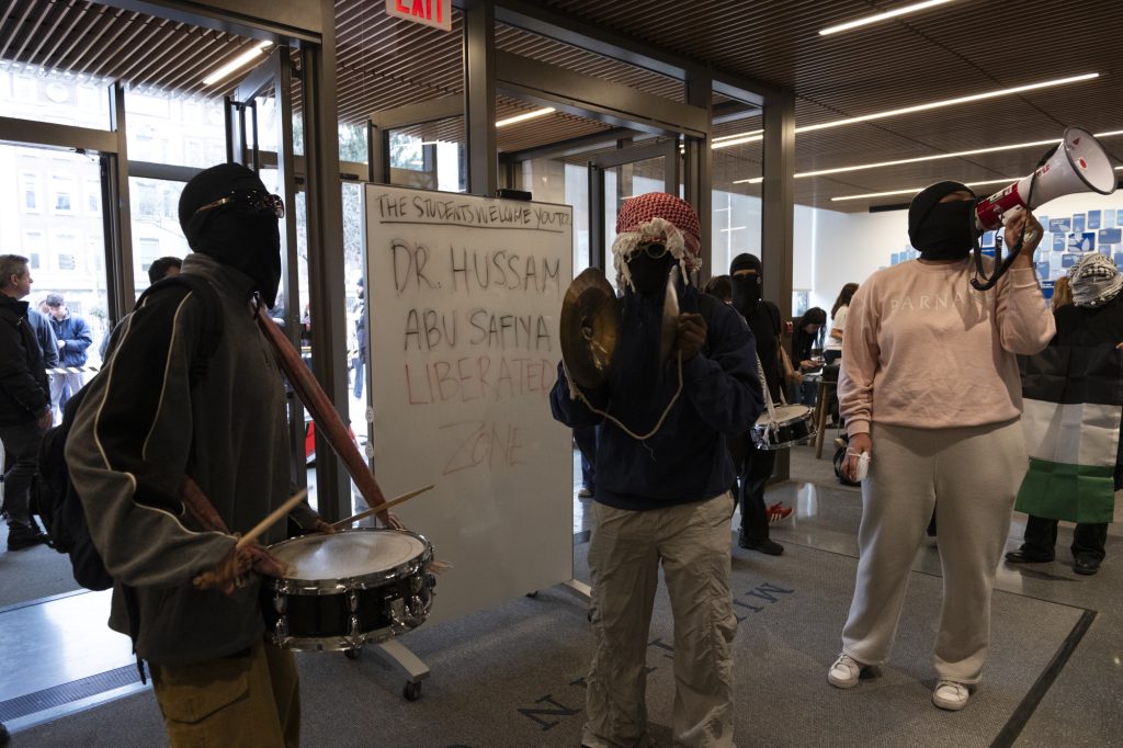 Protesters rename Barnard College's Milstein building after Palestinian doctor Hussam Abu Safiya, who is currently being held captive by Israel, on March 5, 2025. (Photo: Tamara Turki)