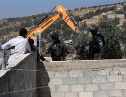 Israeli military excavators demolish a Palestinian Building in Idhna village, west of Hebron in the occupied West Bank, on April 28, 2025. The demolition occurred in Area C, which is under full Israeli control as per the Oslo Accords. In Area C, Palestinian construction permits are routinely denied, making such demolitions a frequent occurrence. (Photo by Mamoun Wazwaz/ apaimages)