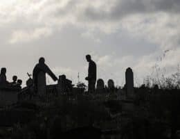 Palestinians visit the graves of their relatives after Eid al-Fitr prayers at Sheikh Radwan Cemetery in Gaza City on March 30, 2025. (Photo: Omar Ashtawy/APA Images)