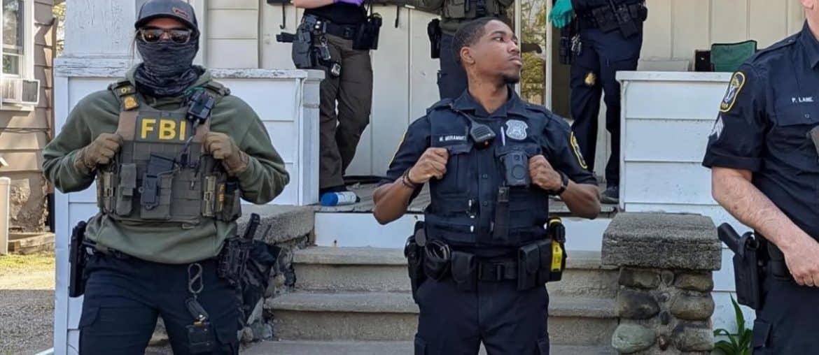 FBI agents and police outside a home in Michigan (Photo via Instagram)