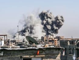 Smoke rises over residential buildings following an Israeli airstrike on the Tuffah neighborhood in the eastern part of Gaza City, May 9, 2025. (Photo: Omar Ashtawy/APA Images)