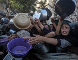 A charity organization distributes hot meals to Palestinians facing difficulties in accessing food due to Israel's ongoing attacks on Gaza, July 20, 2025. (Photo: Omar Ashtawy/apaimages)