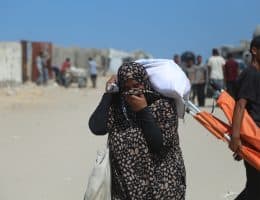 Palestinian women come back from GHF distribution center in southern Gaza, where eyewitnesses say GHF staff pepper-sprayed the aid-seekers and beat them with batons, July 24, 2025. (Photo: Abdallah Alattar/APA Images)