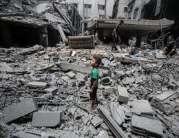 Palestinians inspect the site of a morning Israeli strike on a house, in Gaza City, August 8, 2025. (Photo: Omar Ashtawy/APA Images)