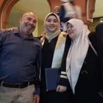 Reem Hamadaqa with her parents at her graduation ceremony from the Islamic University of Gaza in 2021. Both of her parents were killed in an Israeli airstrike in March 2024.