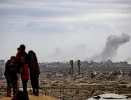 Smoke rises as Israeli forces open fire on Palestinians attempting to return north on al-Rashid Street, October 09, 2025. (Photo: Omar Ashtawy/APA Images)