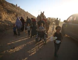 Displaced Palestinians walk with their belongings along the coastal road near Wadi Gaza in the central Gaza Strip, moving toward Gaza City, Friday, Octobrrt 10, 2025. (Photo: Omar Ashtawy/producer APA Images)