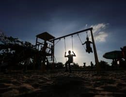 Palestinians celebrate on the third day of Eid al-Adha at a park in Khan Younis in the southern Gaza strip, July 11, 2022. (Photo: Mohammed Dahman/APA Images)