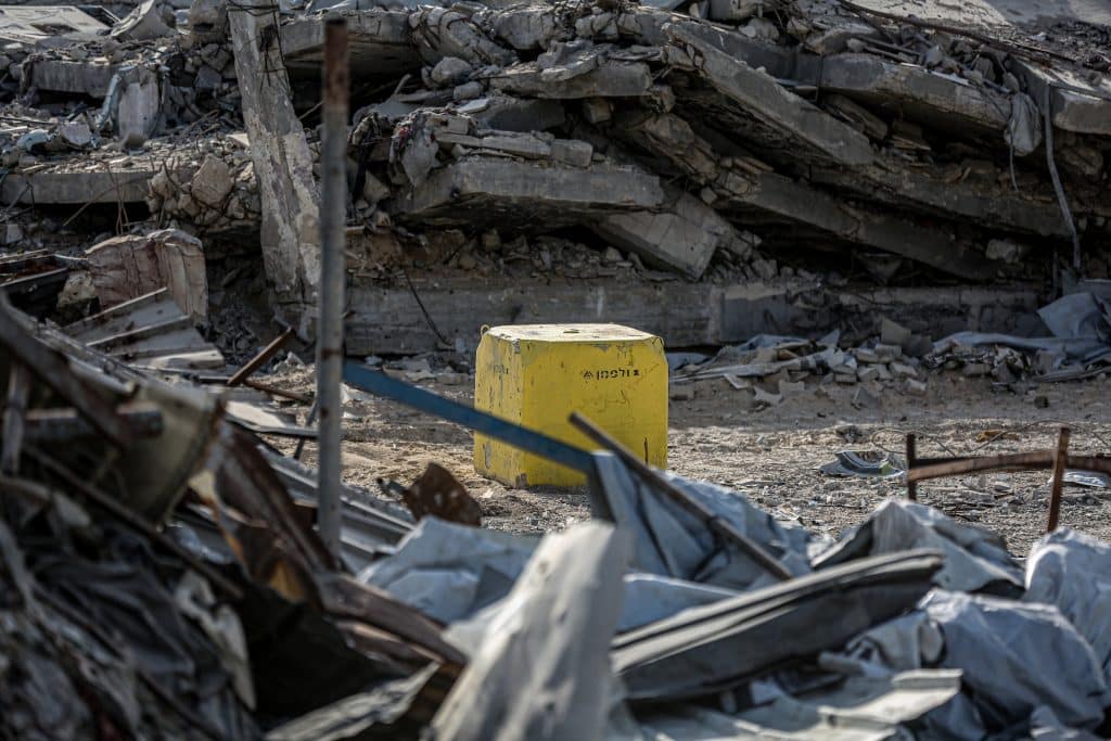 A yellow concrete block, placed by Israeli army, is seen in the Jabalia area in the northern Gaza Strip on November 2, 2025. The markings are intended to indicate the new de-facto security line and buffer zone boundaries established by the army in the strip. (Photo by Omar Ashtawy/ apaimages)