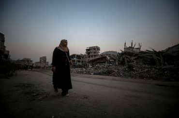 Palestinian families returning to the Shujaiyya neighborhood in eastern Gaza City, continue their lives with limited means among the buildings reduced to rubble by Israeli attacks, on November 4, 2025. (Photo: Omar Ashtawy/APA Images)