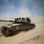 Israeli army tank deploys near the Gaza border, May 20, 2025. (Photo: © Saeed Qaq/ZUMA Press Wire/ZUMA Wire/APA Images)