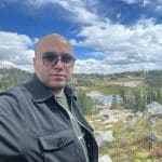 Abdalrahim Abuwarda hiking at Medicine Bow Peak which lies in the heart of the Snowy Range, about 45 minutes west of Laramie, Wyoming.
