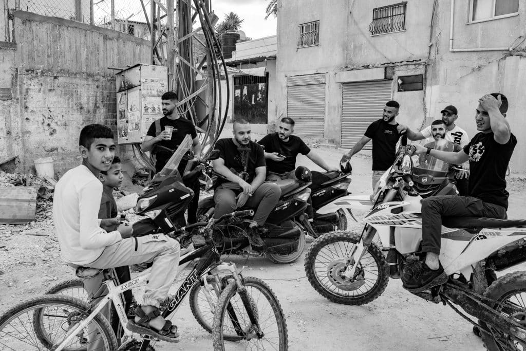 Young boys can be seen with resistance fighters in Jenin refugee camp. (Photo: David Lombeida)
