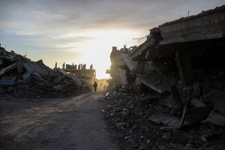 Displaced Palestinians continue their daily lives under difficult conditions inside displacement tents scattered amidst the destruction in the Zeitoun neighborhood, southeast of Gaza City, on December 9, 2025. (Photo: Omar Ashtawy/APA Images)