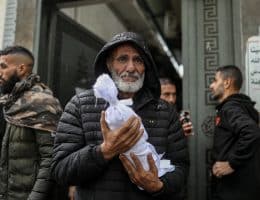 A three-month-old baby, Taym al- Khawaja, froze to death in a tent in the Shati refugee camp, December 12, 2025. (Photo: Omar Ashtawy/APA Images)