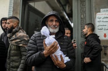 A three-month-old baby, Taym al- Khawaja, froze to death in a tent in the Shati refugee camp, December 12, 2025. (Photo: Omar Ashtawy/APA Images)