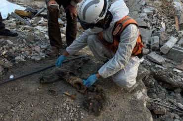 Civil defense teams in Khan Younis recover the bodies of four children from the Abu Hadrous family home in the al-Amal neighborhood, a year and a half after the house was targeted during the genocide in Gaza, December 21, 2025. (Photo: Tariq Mohammad/APA Images)