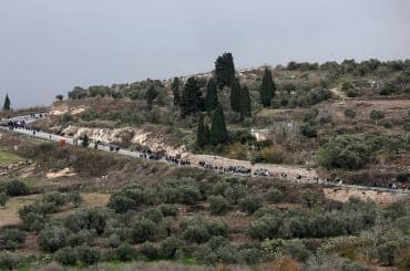 Israeli settlers return to the illegal Israeli outpost of Homesh, December 23, 2021. (Photo: Wajed Nobani/APA Images)