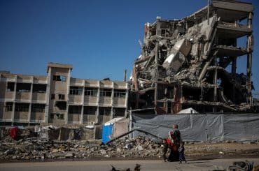 Displaced Palestinians struggle with flooding after heavy rain hits the Tal El-Hawa area in Gaza City, on November 30, 2025. (Photo: Omar Ashtawy/APA Images)