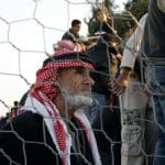 Palestinians stuck in Egypt wait to cross into Gaza at Rafah's border crossing, in the southern Gaza Strip. Egypt has warned Palestinians against trying to break through its resealed Gaza border about two weeks after Hamas militants blew it open to defy an Israeli-led blockade in January 2008. (Photo: APA Images)