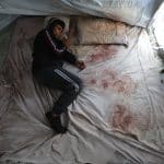 Ahmad Abu Saada in the tent where his wife, Walaa Juha, died in his arms three days after their wedding after a wall collapsed on their tent due to a winter storm, January 7, 2026. (Photo: Omar Ashtawy/APA Images)