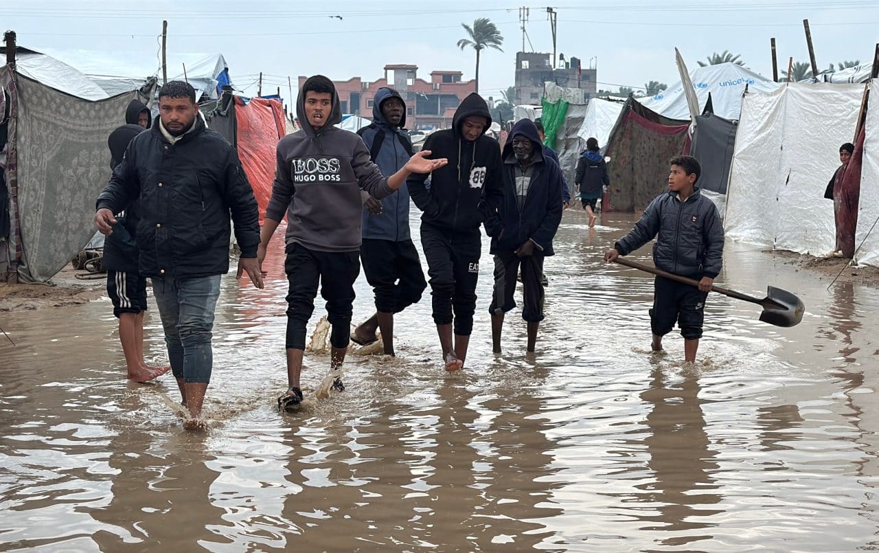 Amid disastrous flooding of displacement camps in Gaza, Israel bans humanitarian organizations providing relief