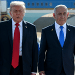 Donald Trump is greeted by Israeli Prime Minister Benjamin Netanyahu after disembarking Air Force One at Ben Gurion International Airport in Israel, Monday, October 13, 2025. (Official White House Photo by Daniel Torok)