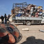 Palestinian Bedouin residents of Ras Ain al-Auja dismantle their homes as Israeli settlers forcibly expel them from their lands, January 2026. (Photo: Wahaj Bani Moufleh)