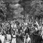 Palestinians in Abu Ghosh taking the oath of allegiance to the Arab cause during the Great Revolt in 1936. (Photo: G. Eric and Edith Matson Photograph Collection)