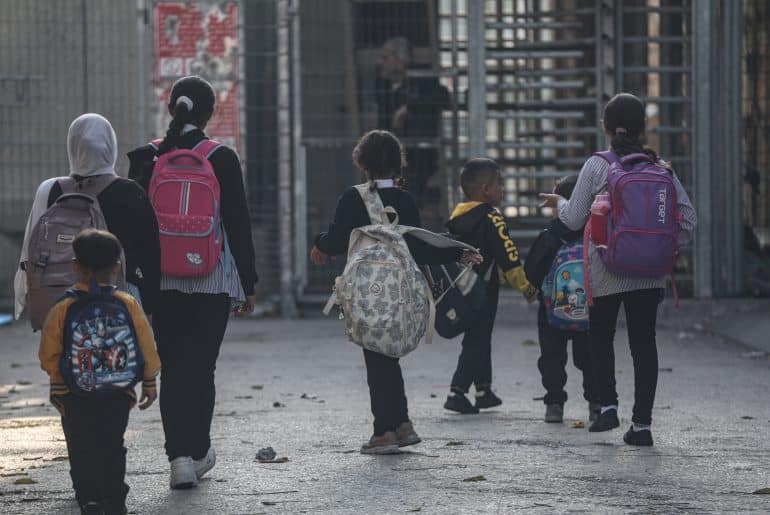 Israeli soldiers close a military checkpoint on Shuhada Street in Hebron's Old City, preventing school students and residents from travelling, October 6, 2024. (Photo: Mamoun Wazwaz/APA Images)