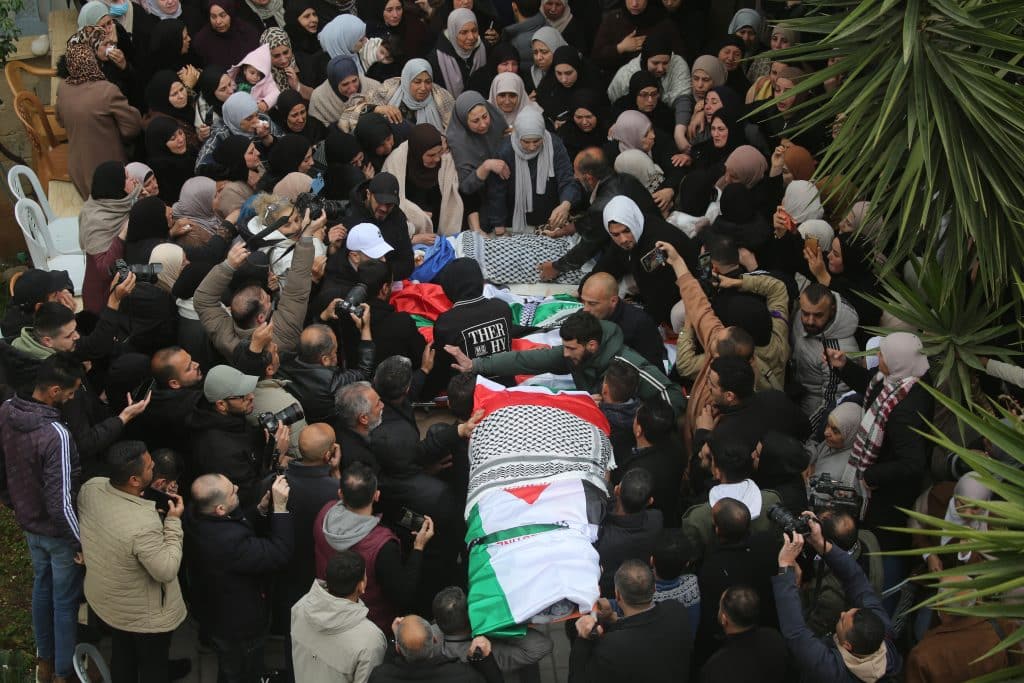The bodies of the four slain members of the Bani Odeh family, including two children, were laid to rest in their hometown of Tammoun in the northern West Bank, days after being gunned down in their car by Israeli soldiers, March 15, 2026. (Photo: Mohammed Nasser/APA Images)