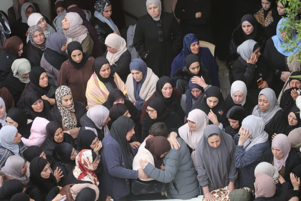 The bodies of the four slain members of the Bani Odeh family, including two children, were laid to rest in their hometown of Tammoun in the northern West Bank, days after being gunned down in their car by Israeli soldiers, March 15, 2026. (Photo: Mohammed Nasser/APA Images)