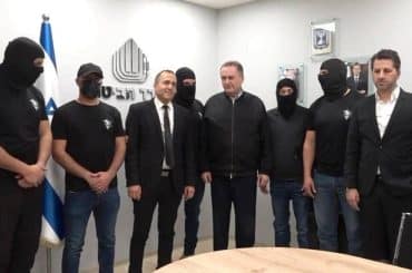 Israel Katz (center) meeting with the Sde Teiman rapists (wearing masks). (Photo: social media)