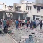 Iranians at a girl's elementary school in Minab, following a devastating airstrike that killed over 140 people, including many schoolchildren. (Source: Social Media)