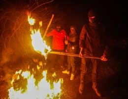 Masked Palestinians on guard duty during the night to fend off attacks by Israeli settlers, south of Nablus March 1, 2023. (Photo: Nasser Ishtayeh/SOPA Images via ZUMA Press Wire/APA Images)