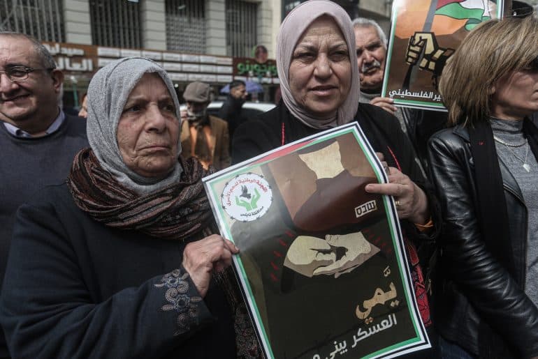 Palestinian women take part in a march demanding the release of female prisoners in Israeli military prisons, Nablus, March 9, 2025. (Photo: Mohammed Nasser/APA Images)